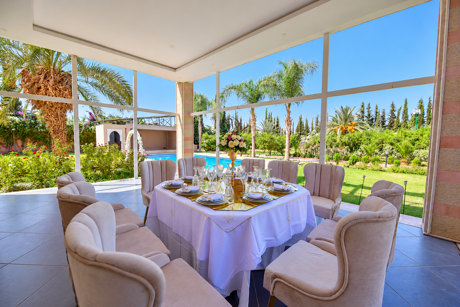 Elegant dining table prepared in the residence garden room.